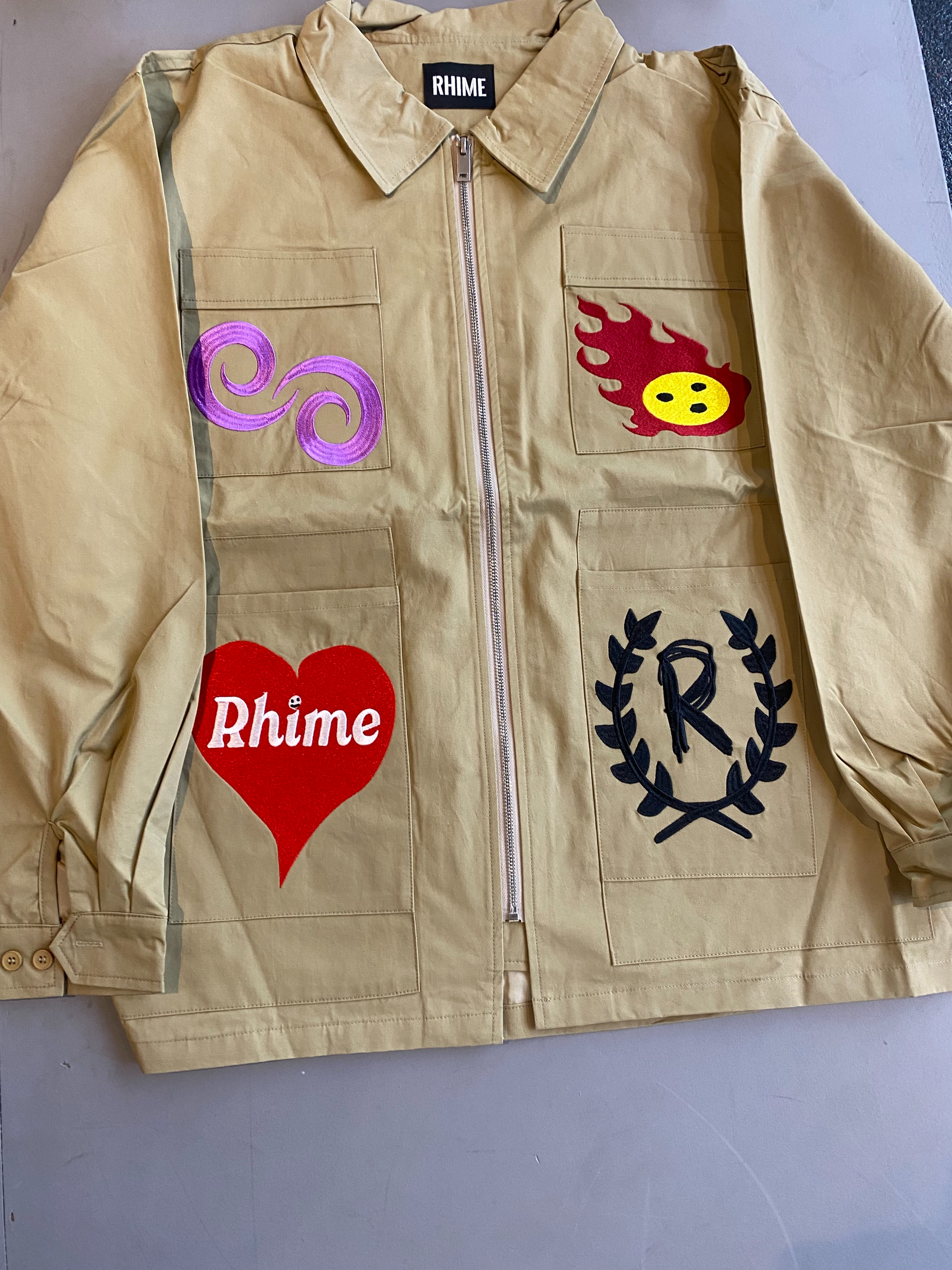 Rhime 'Worldwide" Beige ZipUp Jacket